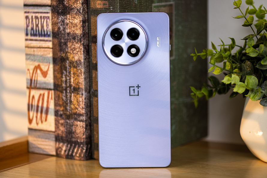 Rear view of the OnePlus Ace 5 Pro, highlighting its Stardust Purple finish and elegant camera module.