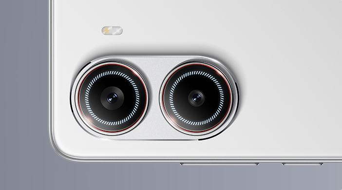 Close-up view of the Redmi Turbo 4’s dual-camera module with intricate detailing.