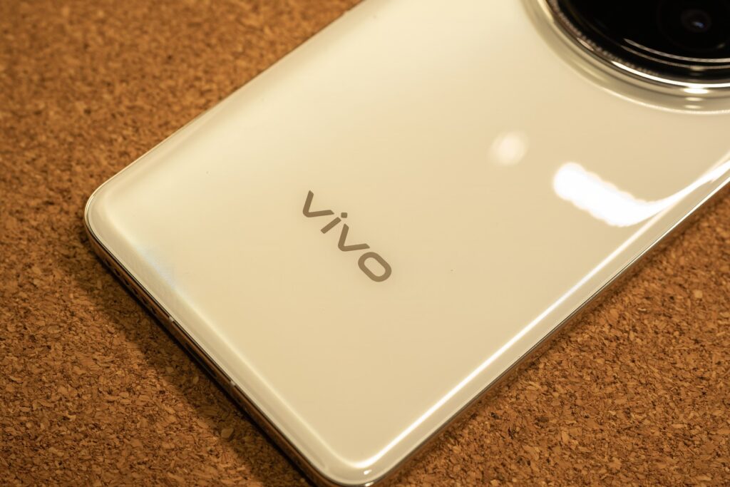 Close-up of the vivo logo on the back cover of the vivo X200 Pro, showcasing its refined branding.