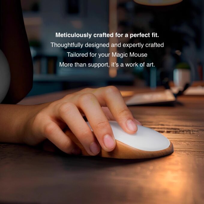 Meticulously crafted for a perfect fit - Image of a hand using a wooden ergonomic stand designed for the Apple Magic Mouse, highlighting its precision craftsmanship and comfort.