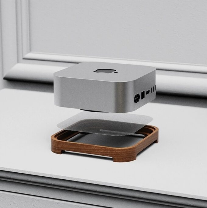 Exploded view of a handcrafted walnut stand for Mac Mini showcasing its layered design with a mesh air filter for dust protection.