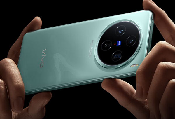 Green vivo smartphone featuring a quad-camera setup with ZEISS optics in a circular module design.