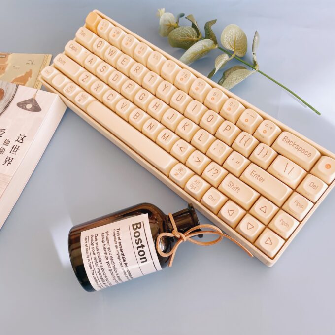 The Lofree Tofu wireless mechanical keyboard placed on a stylish desk setup with accessories, blending seamlessly into the environment.