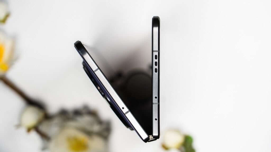 Up view of the OPPO Find N5 foldable smartphone, showcasing its ultra-thin profile and hinge design.