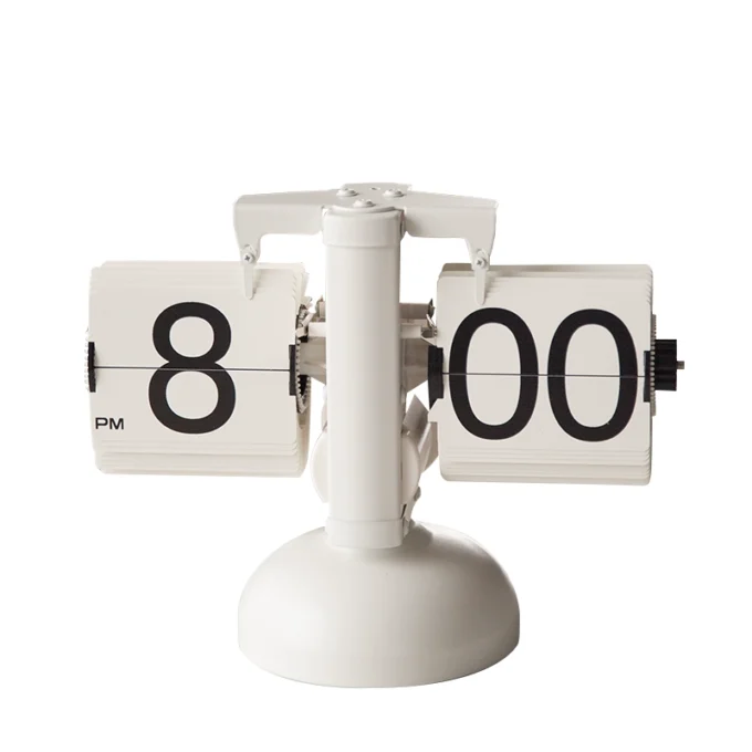 A classic white mechanical flip clock displayed against a neutral background, emphasizing its timeless design.
