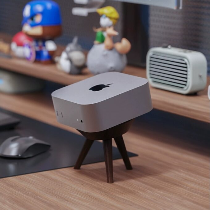 A complete desk setup with a walnut wood Mac Mini stand, perfectly complementing the workspace’s natural and modern vibe.